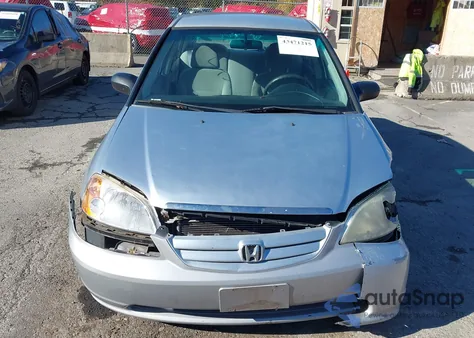 2001 Honda Civic Dx z USA, uszkodzony, nr VIN 1HGES16211L016384